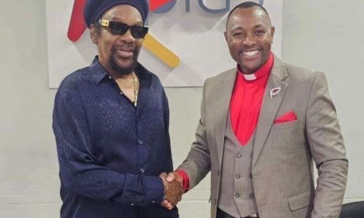 Bishop Ben Kiengei of JCM Church and Glen Washington