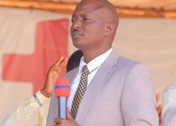Pastor Aloysius Bugingo Behind Kasongo Mbona Weyo