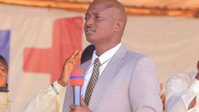 Pastor Aloysius Bugingo Behind Kasongo Mbona Weyo