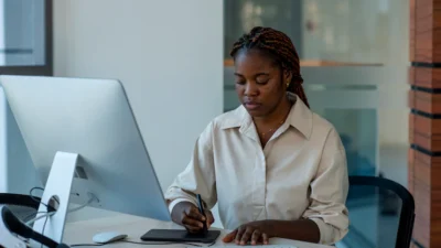 Woman looking for tenders in parastatals