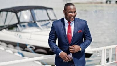 Man standing wearing suit photo