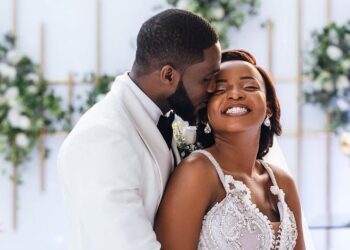 African husband and wife wedding photo