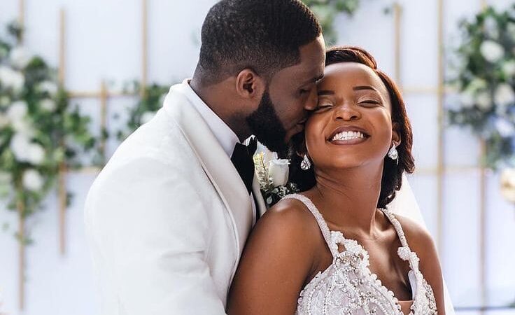 African husband and wife wedding photo