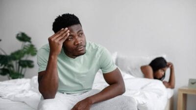 Man and woman in bed photo
