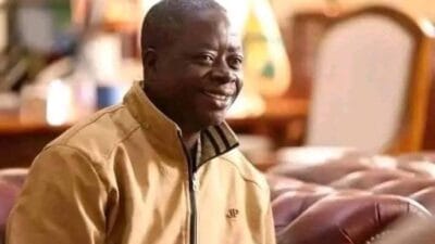 Man laughing at a business