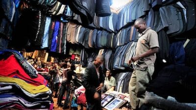 Man selling clothes photo in kenya