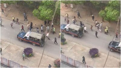Masked police moving with goons photo