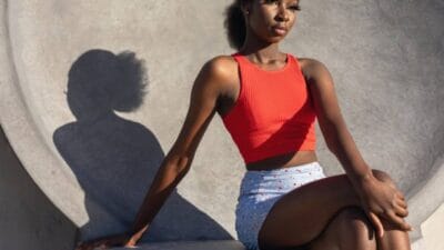 Young african australian teenage girl in urban location. cool attitude.