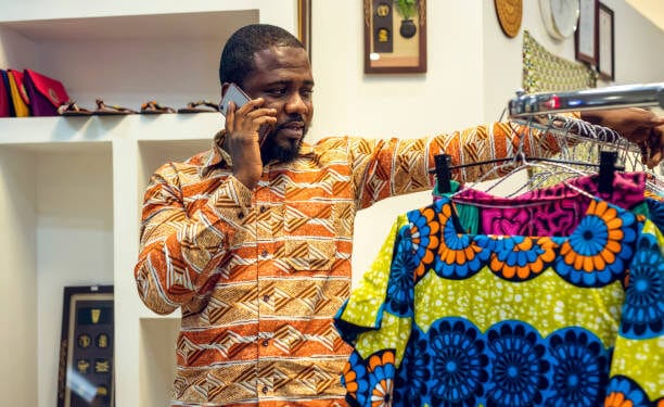 Man talking on mobile phone.