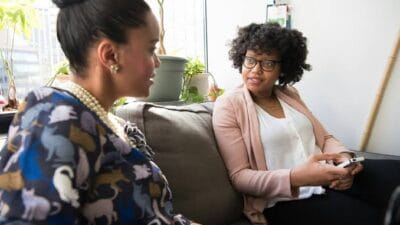 Woman discussing private matter photo