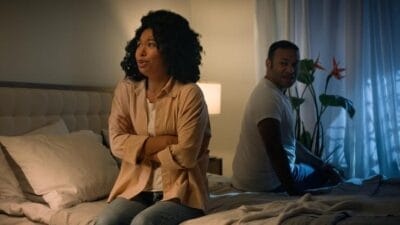 Young couples troubling in bed