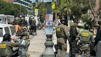 Hundreds of federal agents and military are conducting one of the largest immigration operations in los angeles, targeting macarthur park photo
