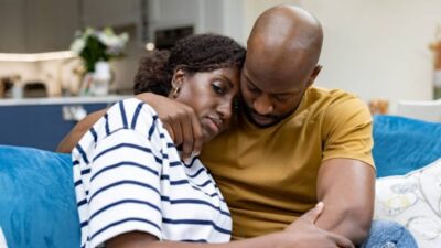 Man and wife cuddling photo