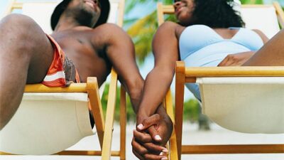 Man and woman photo breezing at the coast in kenya