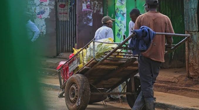 Man hawking water on the street photo