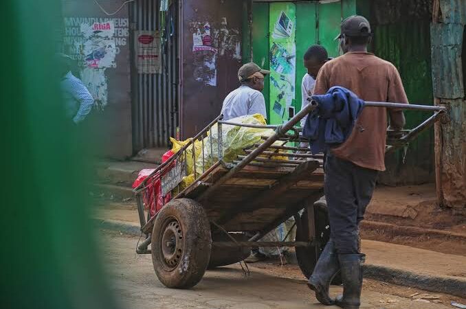Man hawking water on the street photo