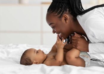Mother and her child cuddling photo