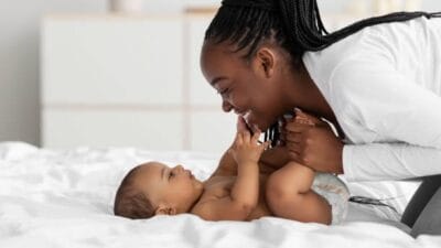 Mother and her child cuddling photo