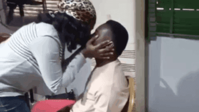 Man kissing his wife photo