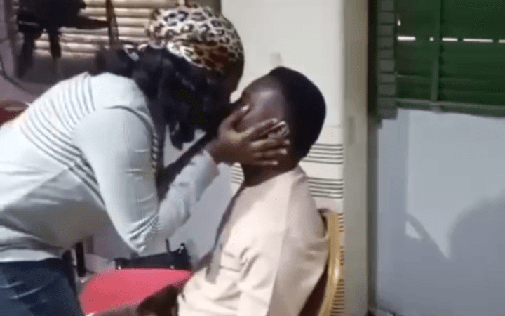 Man kissing his wife photo
