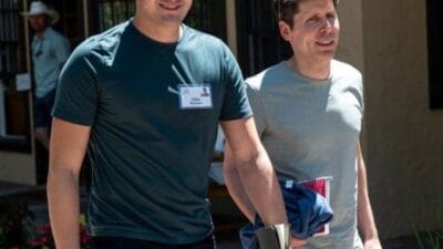 Openai ceo sam altman with his husband oliver mulherin