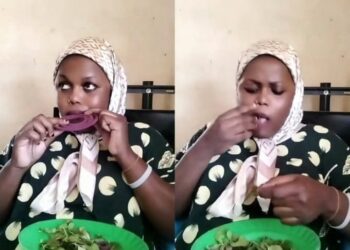 Mombasa woman chewing muguka with mosquito coil