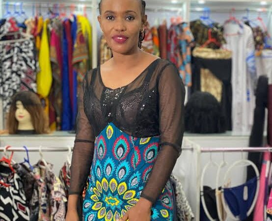 Woman on her business selling mitumba photo