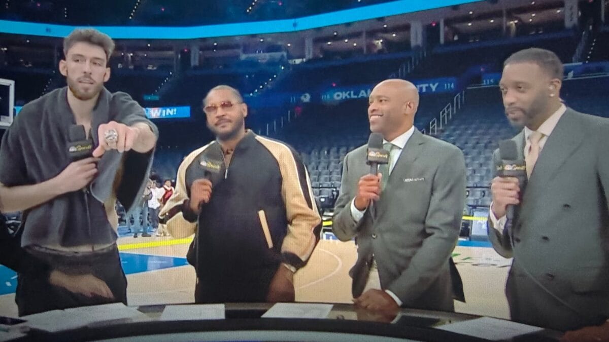 Chet just flexed his finals ring in front of three