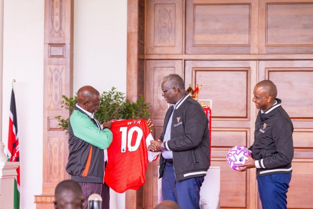 President ruto with real arsenal jersey