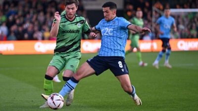 Who updates football live score websites in real time