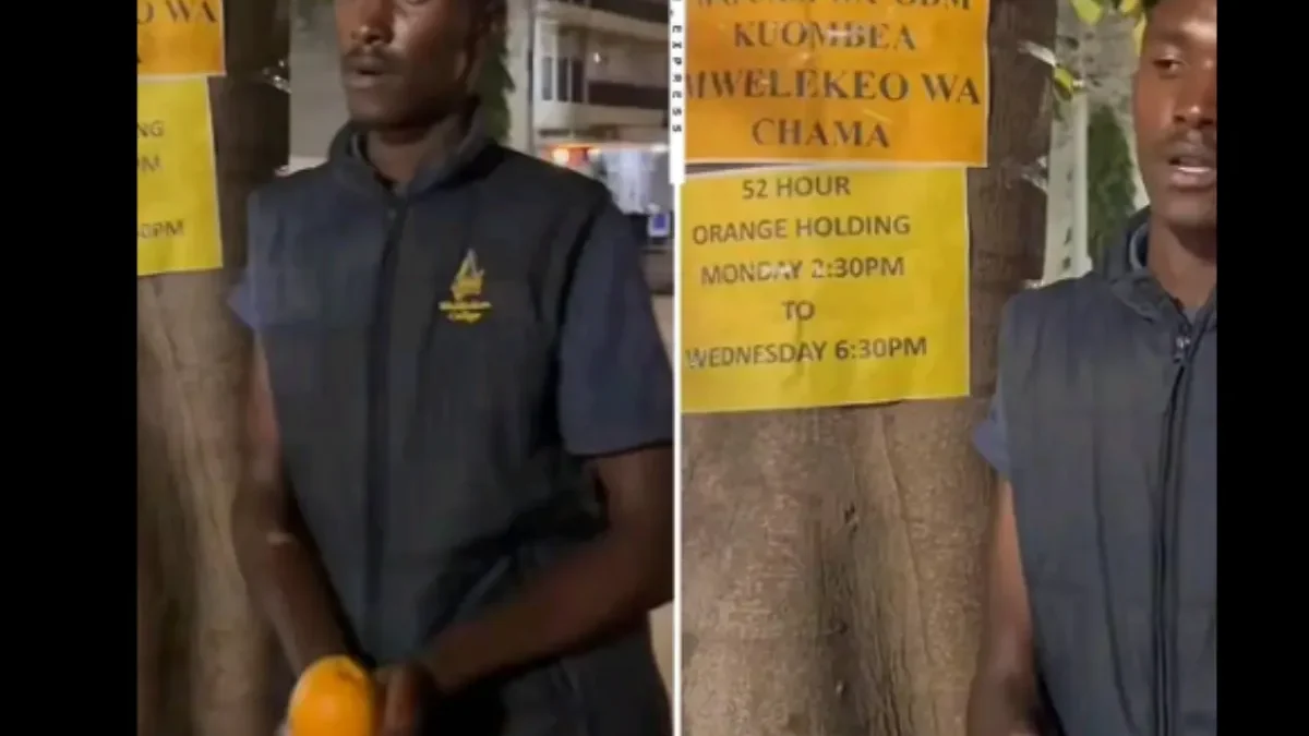 Man holding orange
