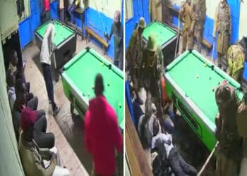 Police beat people for playing poool