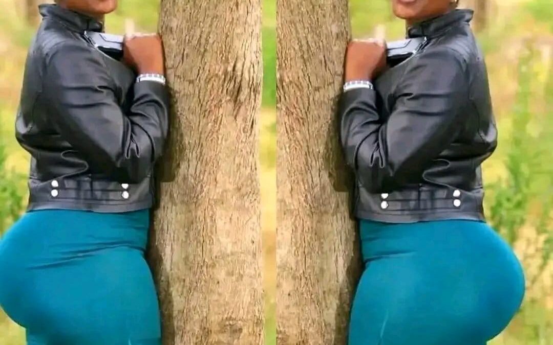 Woman Keroka Kisii hug tree
