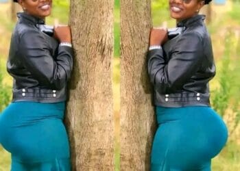 Woman Keroka Kisii hug tree