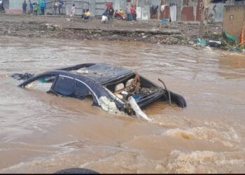 Cars swept floods nairobi