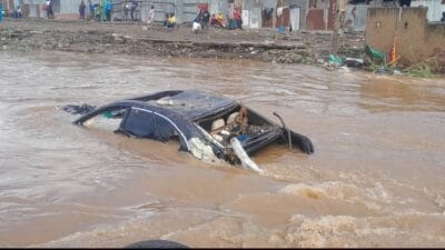 Cars swept floods nairobi