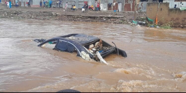 Cars swept floods nairobi