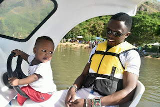Ababu Namwamba with his child in Lake Victoria. PHOTO | Courtesy Ababu Namwamba with his child in Lake Victoria. PHOTO | Courtesy