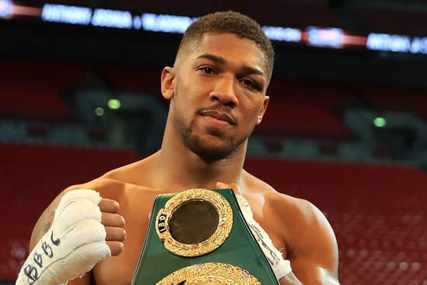 British-Nigerian boxer Anthony Joshua beats Jermaine Franklin despite tension