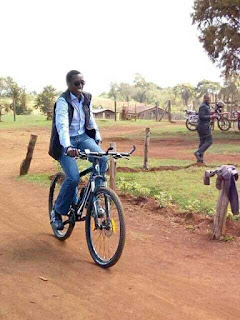 Buzeki ridding a bicycle in Uasin Gishu. PHOTO | Courtesy Buzeki ridding a bicycle in Uasin Gishu. PHOTO | Courtesy