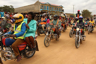Charity Ngilu rides on a motor bike to the stage for a rally.( PHOTO: Mutinda Tom) Is this what made Ngilu resigned from JAP? “UHURUTO Government not worthy a second term”, says Charity Ngilu.