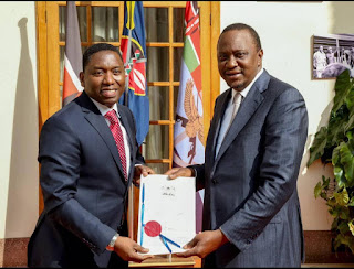 Dan Kazungu with President Kenyatta in Statehouse. PHOTO | Courtesy PSCU