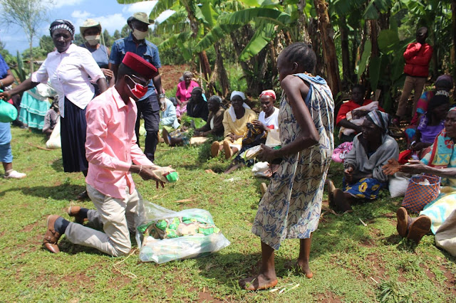 Kimilili MP Didmus Baraka distributing food and household essentials. PHOTO | BMS