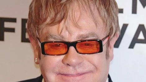 Sir Elton John sued by his former wife Renate Blauel for breaching divorce agreement.
