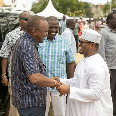Omar Hassan with President Uhuru Kenyatta. PHOTO | FILE Omar Hassan with President Uhuru Kenyatta. PHOTO | FILE
