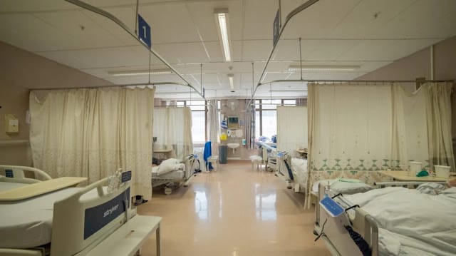 Pregnant woman enjoys with a man on hospital bed, husband catches her red-handed
