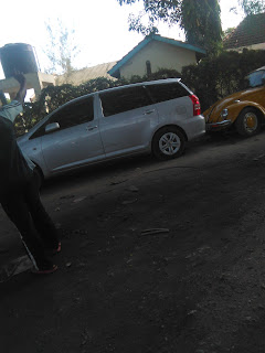 A man car parked in a garage in Nairobi.