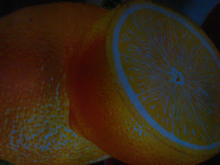 Oranges placed on a basket.