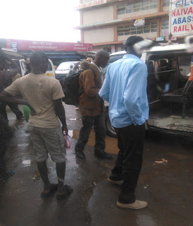 Passenger want to board a matatu