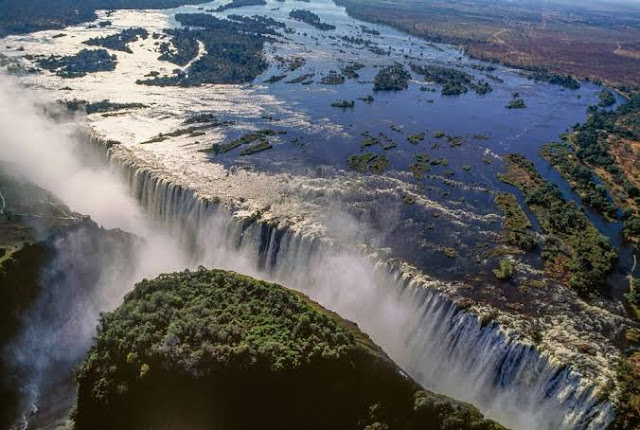Victoria falls in its peak in Zimbabwe Victoria falls in its peak in Zimbabwe